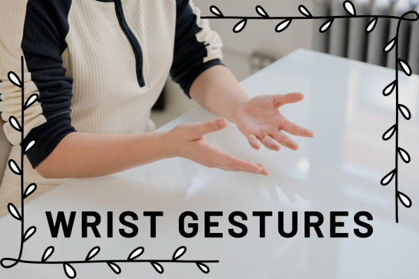 woman doing wrist gesture