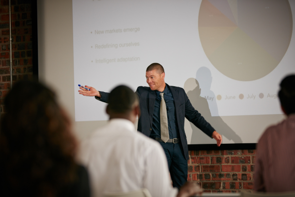 Leader using NLP anchoring to project confidence
