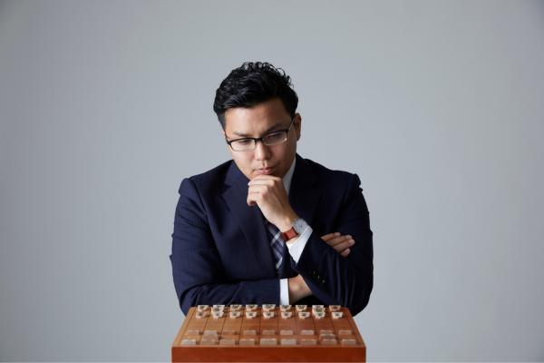 Marketer structuring persuasive messaging with strategic word placement in headlines and calls to action.