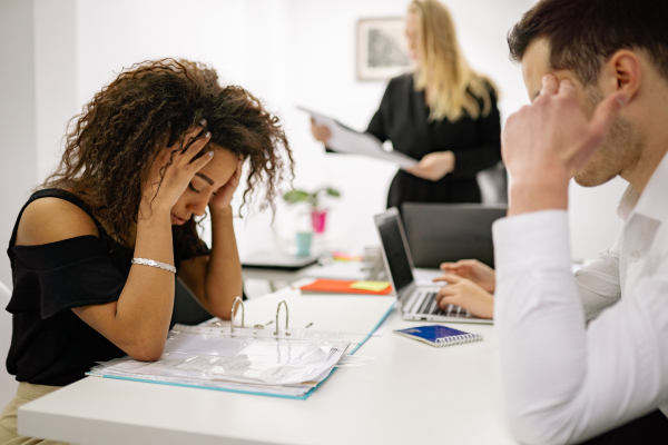 Manager identifying signs of stress and burnout in an employee